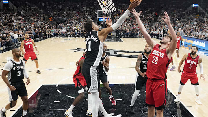 Oct 28, 2024; San Antonio, Texas, USA; San Antonio Spurs center Victor Wembanyama (1) and Houston Rockets center Alperen Sengun (28) battle for the rebound during the second half at Frost Bank Center. Mandatory Credit: Scott Wachter-Imagn Images