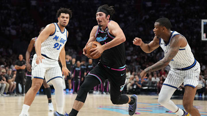 Mar 14, 2026; Miami, Florida, USA; Miami Heat forward Jaime Jaquez Jr. (11) drives to the basket as Orlando Magic forward Noah Penda (93) and forward Jamal Cain (8) defend during the second half at Kaseya Center. Mandatory Credit: Jim Rassol-Imagn Images Mar 14, 2026; Miami, Florida, USA; Miami Heat forward Jaime Jaquez Jr. (11) drives to the basket as Orlando Magic forward Noah Penda (93) and forward Jamal Cain (8) defend during the second half at Kaseya Center. Mandatory Credit: Jim Rassol-Imagn Images