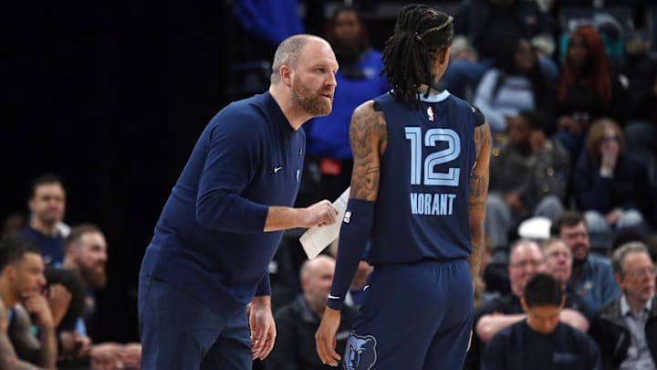 Mar 5, 2025; Memphis, Tennessee, USA; Memphis Grizzlies head coach Taylor Jenkins talks with guard Ja Morant (12) during the second quarter against the Oklahoma City Thunder at FedExForum. Mandatory Credit: Petre Thomas-Imagn Images