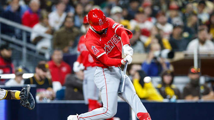 May 13, 2025; San Diego, California, USA; Los Angeles Angels left fielder Matthew Lugo (15) hits a two run home run during the seventh inning against the San Diego Padres at Petco Park. Mandatory Credit: David Frerker-Imagn Images
