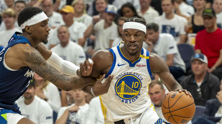 May 14, 2025; Minneapolis, Minnesota, USA; Golden State Warriors forward Jimmy Butler III (10) drives to the basket past Minnesota Timberwolves forward Jaden McDaniels (3) in the second half during game five of the second round for the 2025 NBA Playoffs at Target Center. Mandatory Credit: Jesse Johnson-Imagn Images May 14, 2025; Minneapolis, Minnesota, USA; Golden State Warriors forward Jimmy Butler III (10) drives to the basket past Minnesota Timberwolves forward Jaden McDaniels (3) in the second half during game five of the second round for the 2025 NBA Playoffs at Target Center. Mandatory Credit: Jesse Johnson-Imagn Images