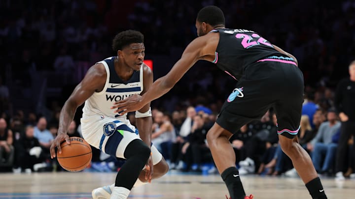 Jan 3, 2026; Miami, Florida, USA; Minnesota Timberwolves guard Anthony Edwards (5) dribbles the basketball against Miami Heat forward Andrew Wiggins (22) during the first quarter at Kaseya Center. Mandatory Credit: Sam Navarro-Imagn Images Jan 3, 2026; Miami, Florida, USA; Minnesota Timberwolves guard Anthony Edwards (5) dribbles the basketball against Miami Heat forward Andrew Wiggins (22) during the first quarter at Kaseya Center. Mandatory Credit: Sam Navarro-Imagn Images