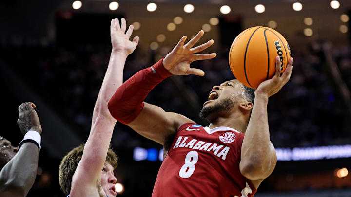 Mar 29, 2025; Newark, NJ, USA; Alabama Crimson Tide guard Chris Youngblood (8) shoots the ball against Duke Blue Devils guard Kon Knueppel (7) during the second half in the East Regional final of the 2025 NCAA tournament at Prudential Center. Mar 29, 2025; Newark, NJ, USA; Alabama Crimson Tide guard Chris Youngblood (8) shoots the ball against Duke Blue Devils guard Kon Knueppel (7) during the second half in the East Regional final of the 2025 NCAA tournament at Prudential Center.