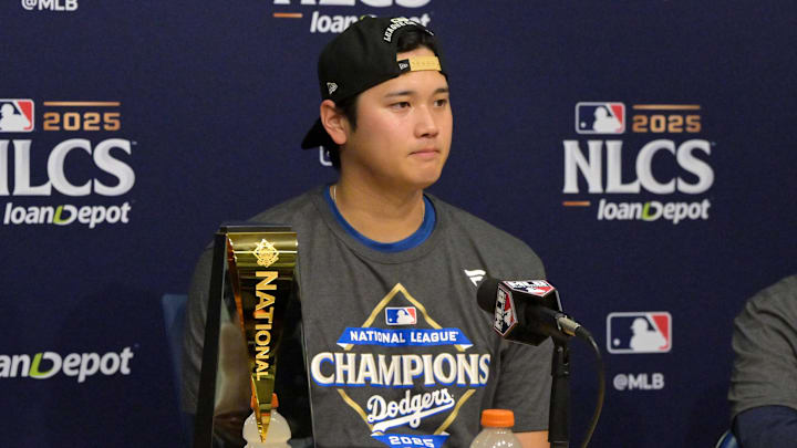 Los Angeles Dodgers two-way player Shohei Ohtani (17) speaks at a press conference after defeating the Milwaukee Brewers in game four of the NLCS round for the 2025 MLB playoffs at Dodger Stadium.
