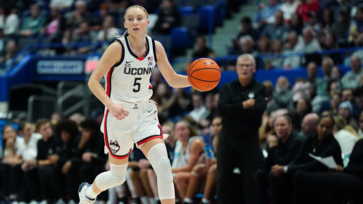 Nov 7, 2024; Storrs, Connecticut, USA; UConn Huskies guard Paige Bueckers (5) returns the ball against the Boston University Terriers in the first half at Harry A. Gampel Pavilion. Mandatory Credit: David Butler II-Imagn Images Nov 7, 2024; Storrs, Connecticut, USA; UConn Huskies guard Paige Bueckers (5) returns the ball against the Boston University Terriers in the first half at Harry A. Gampel Pavilion. Mandatory Credit: David Butler II-Imagn Images