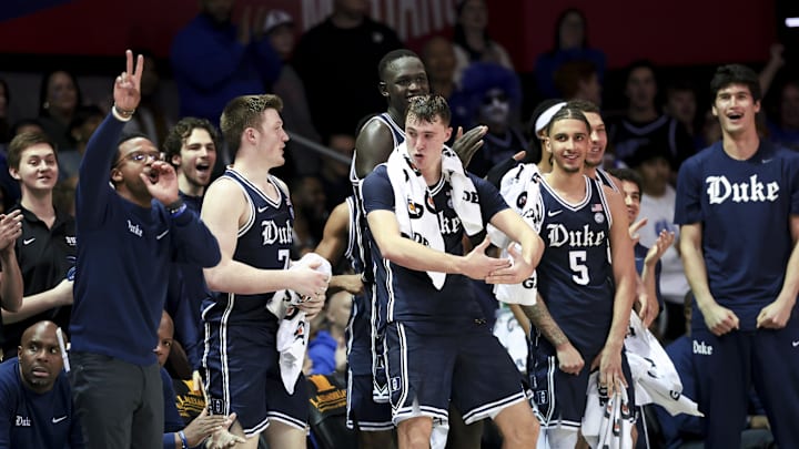 Jan 4, 2025; Dallas, Texas, USA;  Duke basketball guard Cooper Flagg (2) celebrates with teammates on the bench  during the second half against the Southern Methodist Mustangs at Moody Coliseum.