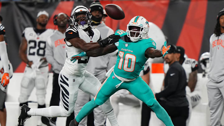 Sep 29, 2022; Cincinnati, Ohio, USA; Cincinnati Bengals cornerback Chidobe Awuzie (22) defends a deep pass intended for Miami Dolphins wide receiver Tyreek Hill (10) in the second quarter at Paycor Stadium in Cincinnati. Mandatory Credit: Kareem Elgazzar-Imagn Images