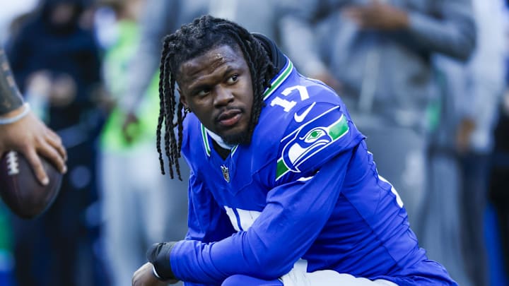 Oct 10, 2024; Seattle, Washington, USA; Seattle Seahawks linebacker Jerome Baker (17) takes a break during pregame warmups against the San Francisco 49ers at Lumen Field. Mandatory Credit: Joe Nicholson-Imagn Images
