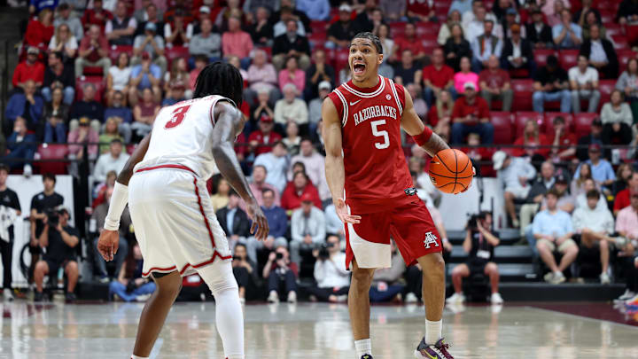 Feb 18, 2026; Tuscaloosa, Alabama, USA; Arkansas Razorback guard Darius Acuff Jr. (5) dribbles against Alabama Crimson Tide guard Latrell Wrightsell Jr. (3) during the first half at Coleman Coliseum. Mandatory Credit: David Leong-Imagn Images Feb 18, 2026; Tuscaloosa, Alabama, USA; Arkansas Razorback guard Darius Acuff Jr. (5) dribbles against Alabama Crimson Tide guard Latrell Wrightsell Jr. (3) during the first half at Coleman Coliseum. Mandatory Credit: David Leong-Imagn Images