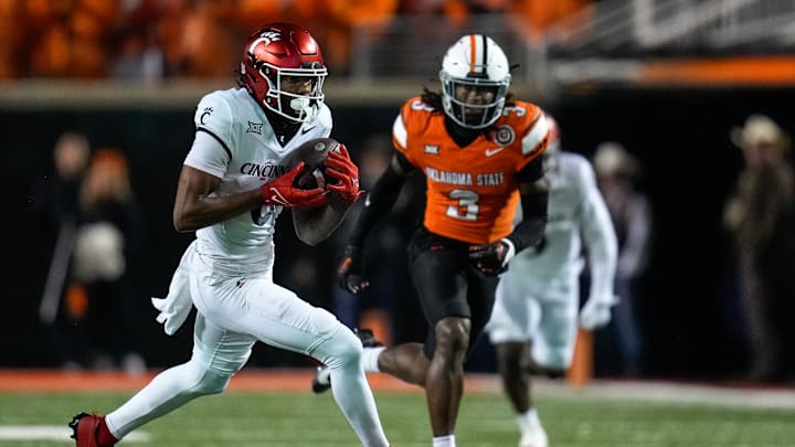 Cincinnati Bearcats wide receiver Xzavier Henderson (8) catches a pass across the middle for a first down in the first quarter of the NCAA Big12 football game between the Oklahoma State Cowboys and the Cincinnati Bearcats at Boone Pickens Stadium in Stillwater, Okla., on Saturday, Oct. 28, 2023.