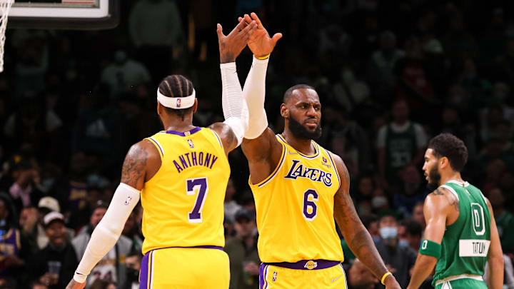 Nov 19, 2021; Boston, Massachusetts, USA; Los Angeles Lakers forward LeBron James (6) and Los Angeles Lakers forward Carmelo Anthony (7) high five during the first half against the Boston Celtics at TD Garden. Mandatory Credit: Paul Rutherford-Imagn Images