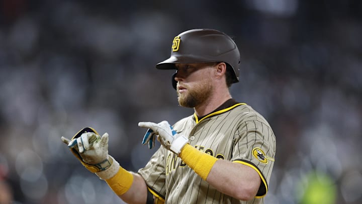 Sep 19, 2025; Chicago, Illinois, USA; San Diego Padres shortstop Jake Cronenworth (9) celebrates after hitting a single against the Chicago White Sox during the third inning at Rate Field. Mandatory Credit: Kamil Krzaczynski-Imagn Images