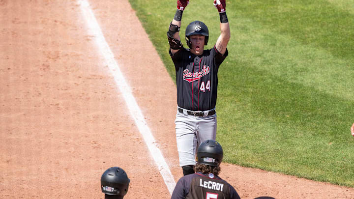 Gamecocks catcher Dalton Reeves (44) with a two-run homer in the top of the ninth inning against the Florida Gators