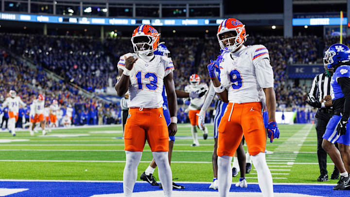 Nov 8, 2025; Lexington, Kentucky, USA; Florida Gators running back Jadan Baugh (13) celebrates with wide receiver J. Michael Sturdivant (9) after scoring a touchdown during the first quarter against the Kentucky Wildcats at Kroger Field. Mandatory Credit: Jordan Prather-Imagn Images Nov 8, 2025; Lexington, Kentucky, USA; Florida Gators running back Jadan Baugh (13) celebrates with wide receiver J. Michael Sturdivant (9) after scoring a touchdown during the first quarter against the Kentucky Wildcats at Kroger Field. Mandatory Credit: Jordan Prather-Imagn Images
