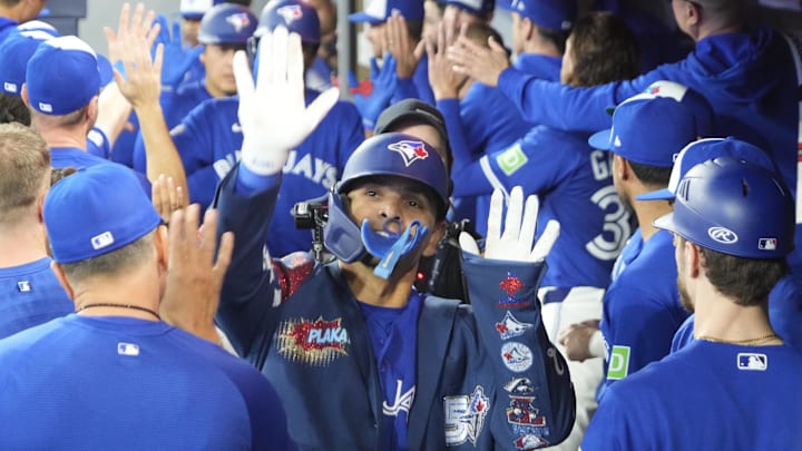 May 11, 2026; Toronto, Ontario, CAN; Toronto Blue Jays shortstop Andres Gimenez (0) gets congratulated after hitting his first home run of the game against the Tampa Bay Rays in the second inning at Rogers Centre. Mandatory Credit: John E. Sokolowski-Imagn Images May 11, 2026; Toronto, Ontario, CAN; Toronto Blue Jays shortstop Andres Gimenez (0) gets congratulated after hitting his first home run of the game against the Tampa Bay Rays in the second inning at Rogers Centre. Mandatory Credit: John E. Sokolowski-Imagn Images