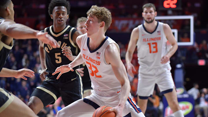 Mar 7, 2025; Champaign, Illinois, USA; Illinois Fighting Illini guard Kasparas Jakucionis (32) drives the ball during the first half against the Purdue Boilermakers at State Farm Center. Mandatory Credit: Ron Johnson-Imagn Images Mar 7, 2025; Champaign, Illinois, USA; Illinois Fighting Illini guard Kasparas Jakucionis (32) drives the ball during the first half against the Purdue Boilermakers at State Farm Center. Mandatory Credit: Ron Johnson-Imagn Images