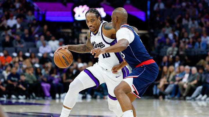 Oct 15, 2025; Sacramento, California, USA; Sacramento Kings guard Demar Derozan (10) dribbles the ball against Los Angeles Clippers guard Chris Paul (3) during the second quarter at Golden 1 Center. Mandatory Credit: Sergio Estrada-Imagn Images Oct 15, 2025; Sacramento, California, USA; Sacramento Kings guard Demar Derozan (10) dribbles the ball against Los Angeles Clippers guard Chris Paul (3) during the second quarter at Golden 1 Center. Mandatory Credit: Sergio Estrada-Imagn Images