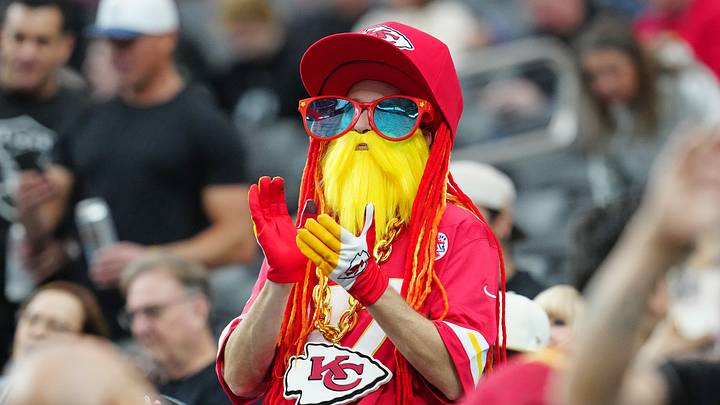 Jan 4, 2026; Paradise, Nevada, USA; A Kansas City Chiefs fan claps before the start of a game between the Chiefs and the Las Vegas Raiders at Allegiant Stadium. Mandatory Credit: Stephen R. Sylvanie-Imagn Images Jan 4, 2026; Paradise, Nevada, USA; A Kansas City Chiefs fan claps before the start of a game between the Chiefs and the Las Vegas Raiders at Allegiant Stadium. Mandatory Credit: Stephen R. Sylvanie-Imagn Images