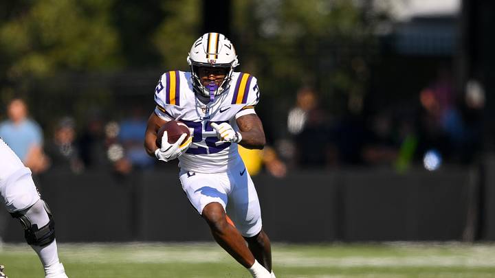 Louisiana State Tigers running back Harlem Berry runs with the ball. Louisiana State Tigers running back Harlem Berry runs with the ball.