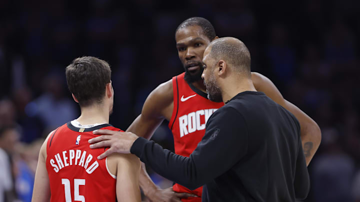 Feb 7, 2026; Oklahoma City, Oklahoma, USA; Houston Rockets Head Coach Ime Udoka talks to Houston Rockets forward Kevin Durant (7) and guard Reed Sheppard (15) during the second half at Paycom Center. Mandatory Credit: Alonzo Adams-Imagn Images Feb 7, 2026; Oklahoma City, Oklahoma, USA; Houston Rockets Head Coach Ime Udoka talks to Houston Rockets forward Kevin Durant (7) and guard Reed Sheppard (15) during the second half at Paycom Center. Mandatory Credit: Alonzo Adams-Imagn Images