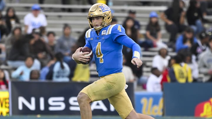 Nov 30, 2024; Pasadena, California, USA; UCLA Bruins quarterback Ethan Garbers (4) scrambles out of the pocket against the Fresno State Bulldogs during the fourth quarter at Rose Bowl. Mandatory Credit: Robert Hanashiro-Imagn Images