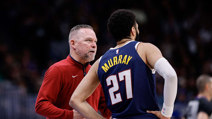 Denver Nuggets head coach Michael Malone talks with guard Jamal Murray (27) in the third quarter against the Milwaukee Bucks at Ball Arena. Denver Nuggets head coach Michael Malone talks with guard Jamal Murray (27) in the third quarter against the Milwaukee Bucks at Ball Arena.