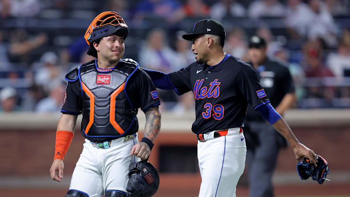 Aug 14, 2025; New York City, New York, USA; New York Mets catcher Francisco Alvarez (4) and relief pitcher Edwin Diaz (39) walk off the field after the top of the ninth inning against the Atlanta Braves at Citi Field. Mandatory Credit: Brad Penner-Imagn Images
