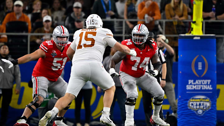 Jan 10, 2025; Arlington, TX, USA; Ohio State Buckeyes offensive lineman Luke Montgomery (51) and offensive lineman Donovan Jackson (74) and Texas Longhorns defensive lineman Bill Norton (15) in action during the game between the Texas Longhorns and the Ohio State Buckeyes at AT&T Stadium. Mandatory Credit: Jerome Miron-Imagn Images