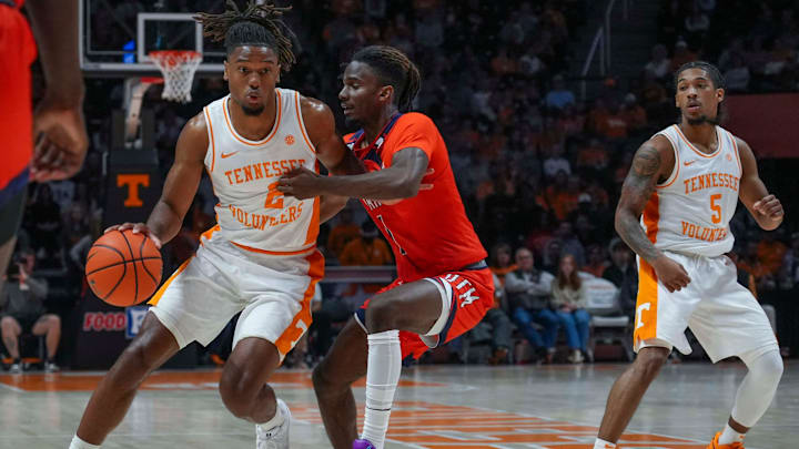Tennessee guard Chaz Lanier (2) runs around UT Martin guard Tarence Guinyard (1) during an NCAA basketball game between the Tennessee Volunteers and UT Martin Skyhawks at Thompson-Boling Arena at Food City Center on Wednesday, Nov. 27, 2024. Mandatory Credit: Angelina Alcantar/USA TODAY NETWORK via Imagn Images
