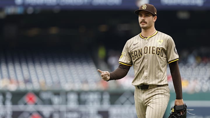 Jul 25, 2024; Washington, District of Columbia, USA; San Diego Padres starting pitcher Dylan Cease (84) gestures to his dugout after completing the seventh inning against the Washington Nationals at Nationals Park. Mandatory Credit: Geoff Burke-Imagn Images