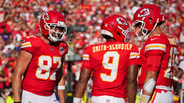 Sep 28, 2025; Kansas City, Missouri, USA; Kansas City Chiefs wide receiver Juju Smith-Schuster (9) celebrates with quarterback Patrick Mahomes (15) and tight end Travis Kelce (87) against the Baltimore Ravens after scoring during the game at GEHA Field at Arrowhead Stadium. Mandatory Credit: Denny Medley-Imagn Images