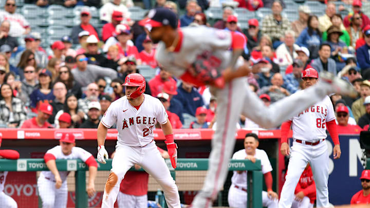 Apr 12, 2023; Anaheim, California, USA; Los Angeles Angels designated hitter Mike Trout (27) leads off from third as Washington Nationals relief pitcher Carl Edwards Jr. (58) throws during the seventh inning at Angel Stadium. Mandatory Credit: Gary A. Vasquez-Imagn Images