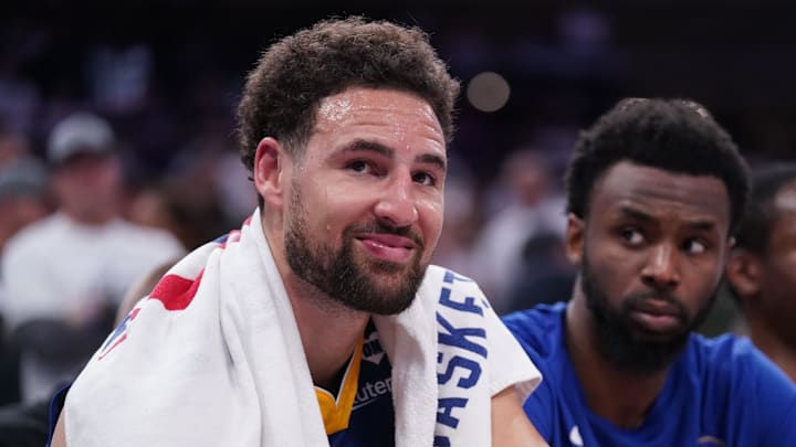Apr 16, 2024; Sacramento, California, USA; Golden State Warriors guard Klay Thompson (11) sits on the bench during action against the Sacramento Kings in the fourth quarter during a play-in game of the 2024 NBA playoffs at the Golden 1 Center. Mandatory Credit: Cary Edmondson-USA TODAY Sports
