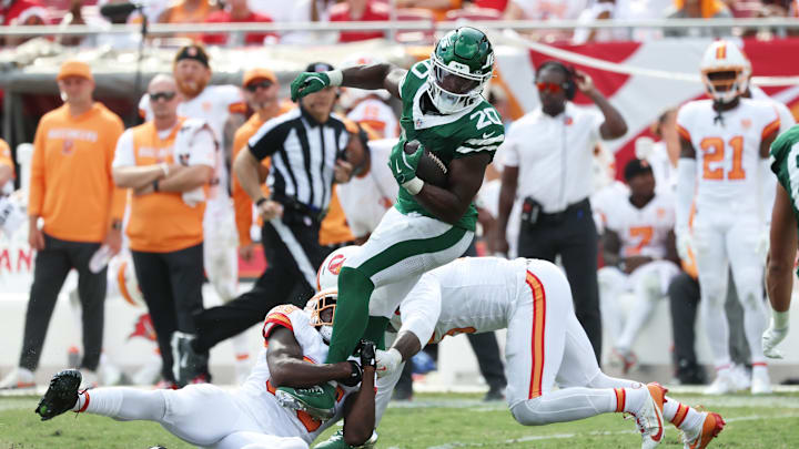 Sep 21, 2025; Tampa, Florida, USA; Tampa Bay Buccaneers outside linebacker Haason Reddick (5) and cornerback Jamel Dean (35) tackle New York Jets running back Breece Hall (20) during the second half at Raymond James Stadium. Mandatory Credit: Kim Klement Neitzel-Imagn Images Sep 21, 2025; Tampa, Florida, USA; Tampa Bay Buccaneers outside linebacker Haason Reddick (5) and cornerback Jamel Dean (35) tackle New York Jets running back Breece Hall (20) during the second half at Raymond James Stadium. Mandatory Credit: Kim Klement Neitzel-Imagn Images