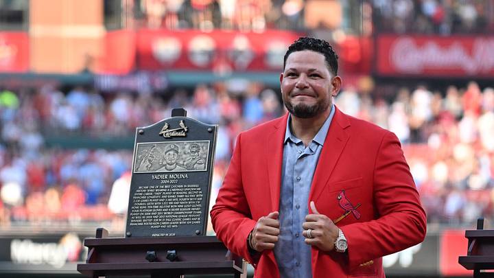 Sep 12, 2026; St. Louis, Missouri, USA;  Yadier Molina stands next to his St. Louis Cardinals Hall of Fame plaque during a ceremony before a game between the St. Louis Cardinals and the Chicago White Sox at Busch Stadium.  Mandatory Credit: Jeff Le-Imagn Images
