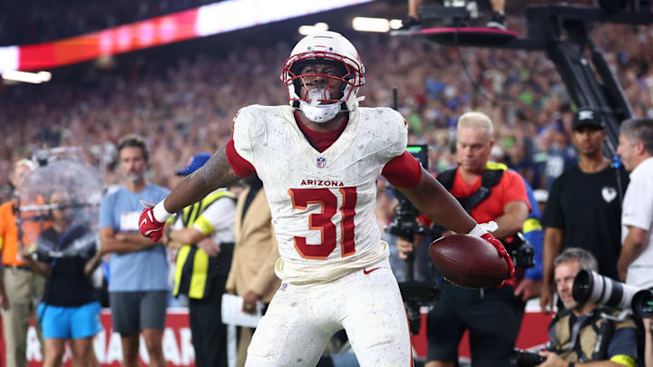 Sep 25, 2025; Glendale, Arizona, USA; Arizona Cardinals running back Emari Demercado (31) celebrates scoring a touchdown against the Seattle Seahawks in the fourth quarter at State Farm Stadium. Mandatory Credit: Mark J. Rebilas-Imagn Images Sep 25, 2025; Glendale, Arizona, USA; Arizona Cardinals running back Emari Demercado (31) celebrates scoring a touchdown against the Seattle Seahawks in the fourth quarter at State Farm Stadium. Mandatory Credit: Mark J. Rebilas-Imagn Images