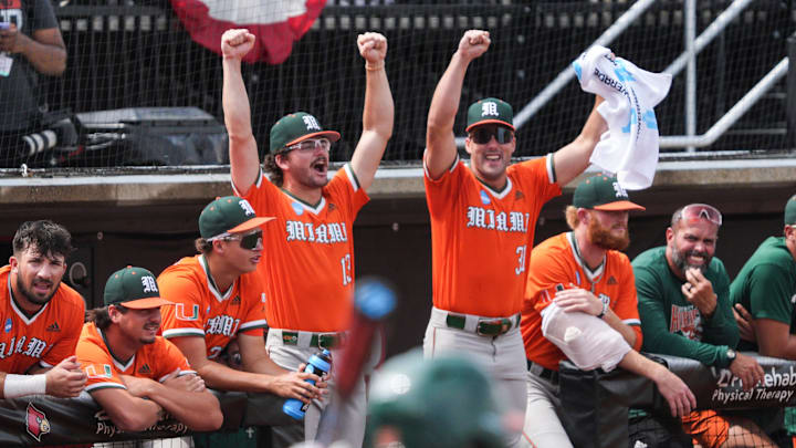 The Miami celebrates as the Canes load the bases against the Cards in the NCAA baseball Super Regional game at Jim Patterson Stadium in Louisville, Kentucky Friday afternoon. June 6, 2025
