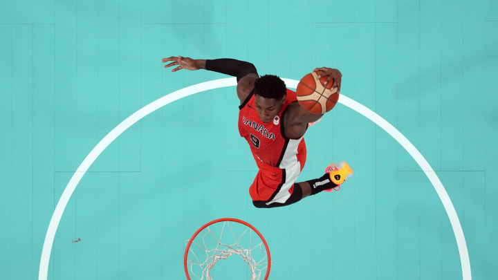 Jul 27, 2024; Villeneuve-d'Ascq, France; Canada small forward Rj Barrett (9) shoots against Greece in the second half during the Paris 2024 Olympic Summer Games at Stade Pierre-Mauroy. Mandatory Credit: John David Mercer-USA TODAY Sports Jul 27, 2024; Villeneuve-d'Ascq, France; Canada small forward Rj Barrett (9) shoots against Greece in the second half during the Paris 2024 Olympic Summer Games at Stade Pierre-Mauroy. Mandatory Credit: John David Mercer-USA TODAY Sports