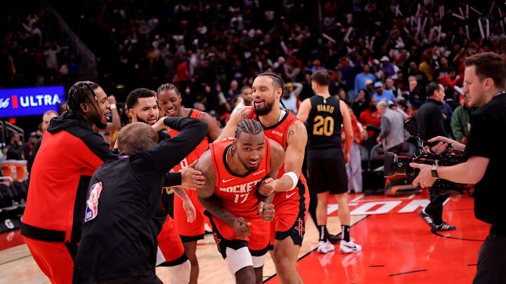 Jan 22, 2025; Houston, Texas, USA; Houston Rockets forward Tari Eason (17) is congratulated by teammates following the game against the Cleveland Cavaliers at Toyota Center. Mandatory Credit: Erik Williams-Imagn Images