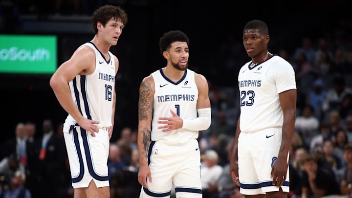 Former Clemson Tiger PJ Hall signed a two-way contract with the Memphis Grizzlies for the 2025-26 season after being released by the Denver Nuggets.