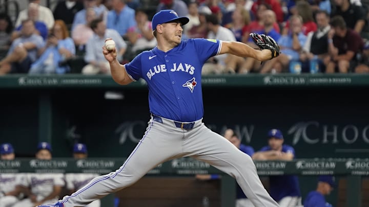 Toronto Blue Jays pitcher Erik Swanson (50) throws to the plate during the eighth inning against the Texas Rangers at Globe Life Field in 2024.