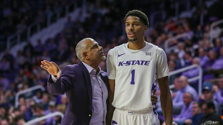 Jan 29, 2025; Manhattan, Kansas, USA; Kansas State Wildcats head coach Jerome Tang talks to forward David N'Guessan (1) during a break in the action against the Oklahoma State Cowboys at Bramlage Coliseum. Mandatory Credit: Scott Sewell-Imagn Images Jan 29, 2025; Manhattan, Kansas, USA; Kansas State Wildcats head coach Jerome Tang talks to forward David N'Guessan (1) during a break in the action against the Oklahoma State Cowboys at Bramlage Coliseum. Mandatory Credit: Scott Sewell-Imagn Images