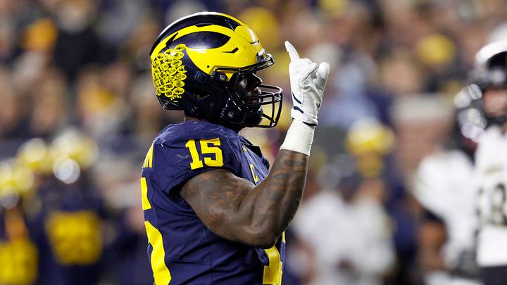 Nov 1, 2025; Ann Arbor, Michigan, USA;  Michigan Wolverines linebacker Ernest Hausmann (15) reacts after he makes a play on defense against the Purdue Boilermakers in the first half at Michigan Stadium. Mandatory Credit: Rick Osentoski-Imagn Images