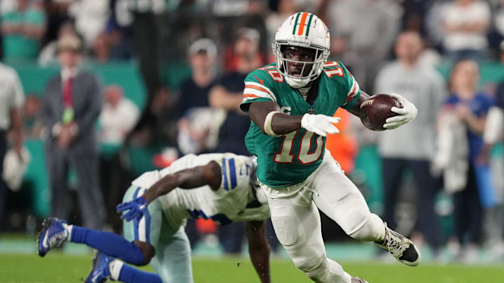Former Miami Dolphins wide receiver Tyreek Hill in the open field against the Dallas Cowboys in a 2023 game.