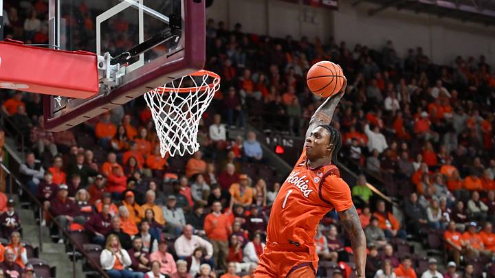 Feb 21, 2026; Blacksburg, Virginia, USA;  Virginia Tech Hokies forward Tobi Lawal (1) goes up for a dunk against the Wake Forest Demon Deacons during the second half at Cassell Coliseum. Mandatory Credit: Brian Bishop-Imagn Images