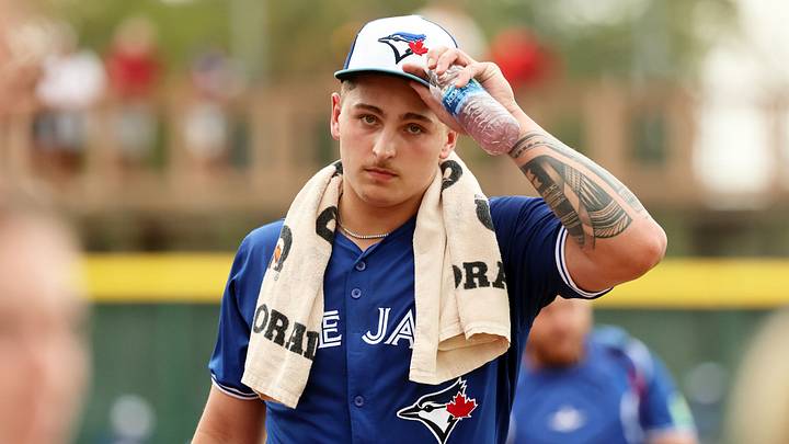 Mar 21, 2024; Bradenton, Florida, USA; Toronto Blue Jays pitcher Ricky Tiedemann (70) walks to the dugout before the game against the Pittsburgh Pirates at LECOM Park. Mandatory Credit: Kim Klement Neitzel-USA TODAY Sports