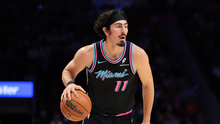 Nov 17, 2025; Miami, Florida, USA; Miami Heat forward Jaime Jaquez Jr. (11) dribbles the basketball against New York Knicks during the first quarter at Kaseya Center. Mandatory Credit: Sam Navarro-Imagn Images