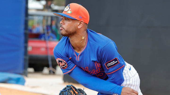 Feb 17, 2026; Port St. Lucie, FL, USA;  New York Mets pitcher Freddy Peralta (51) throws a pitch during the New York Mets spring training workouts at Clover Park. Mandatory Credit: Reinhold Matay-Imagn Images