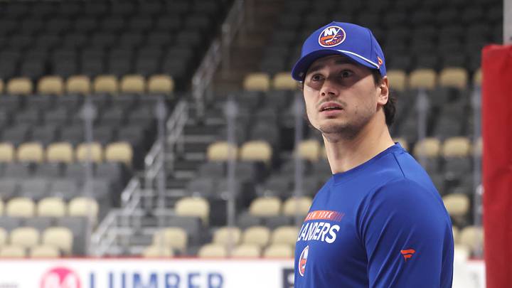 Oct 9, 2025; Pittsburgh, Pennsylvania, USA; New York Islanders defenseman Alexander Romanov (28) looks on from the bench before playing the Pittsburgh Penguins at PPG Paints Arena. Mandatory Credit: Charles LeClaire-Imagn Images Oct 9, 2025; Pittsburgh, Pennsylvania, USA; New York Islanders defenseman Alexander Romanov (28) looks on from the bench before playing the Pittsburgh Penguins at PPG Paints Arena. Mandatory Credit: Charles LeClaire-Imagn Images