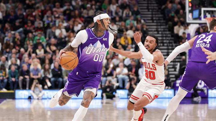 Mar 17, 2025; Salt Lake City, Utah, USA;  Utah Jazz guard Jordan Clarkson (00) brings the ball up the court during the second quarter against the Chicago Bulls at Delta Center. Mandatory Credit: Chris Nicoll-Imagn Images